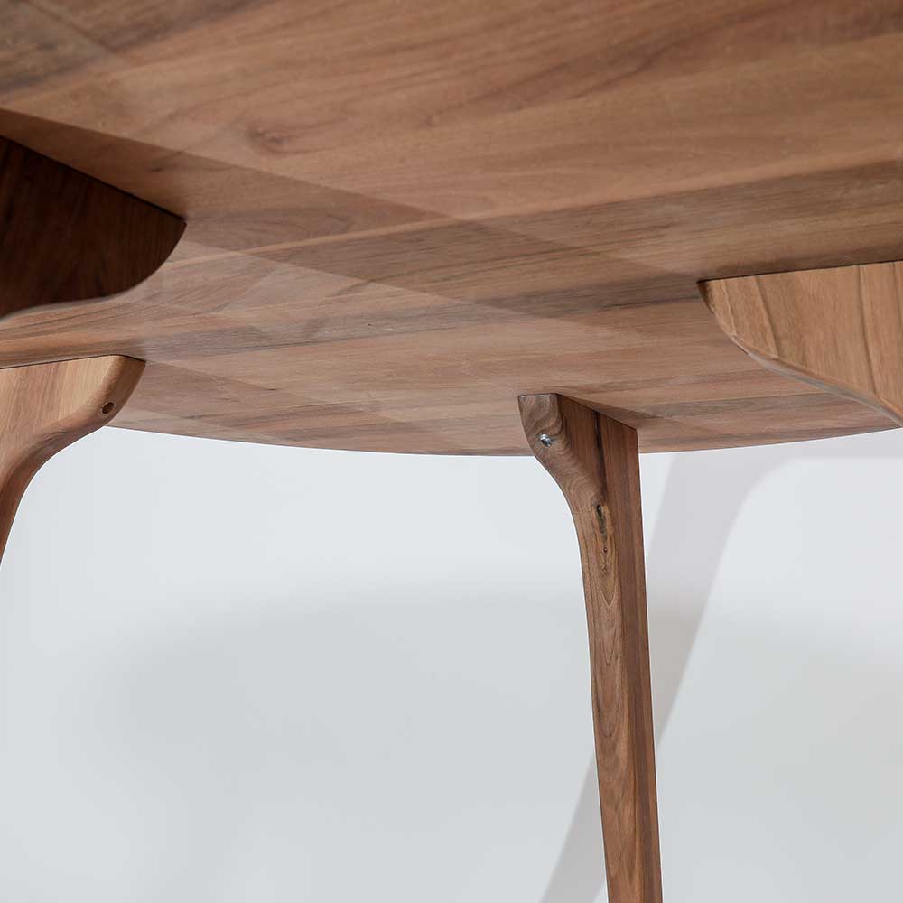 Picture of a quality wood dining table from the bottom.